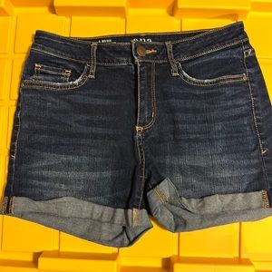 a.n.a denim shorts. 3.5” mid ride. Size 4. Rolled Hem Dark Wash